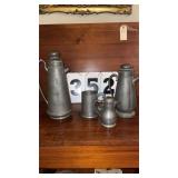 appears to be a vintage or antique pewter coffee