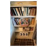 3 shelves of cook books.