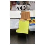 8 assorted cutting boards and baking sheets