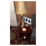 2 drawer end table, lamp and 3 items included.