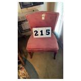 vintage pink upholstered slipper chair features
