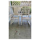 2 white rocking chairs