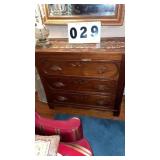 appears to be an antique Victorian walnut