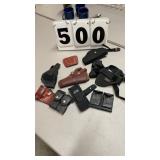 Holsters and ammo case.