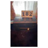 antique or vintage dome-top steamer trunk,