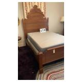 Antique double bed. 55 inches wide, 82 inches