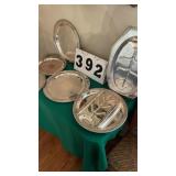 6 silver plated serving trays.