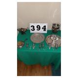 1 antique round metal plate, which resembles an