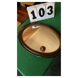 Oval wall mirror 23 inches x 17 inches.