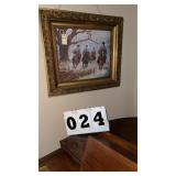 framed artwork appears to be a limited-edition