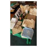 Assorted napkins, table covers, angels, salt and