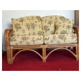 Rattan Loveseat with Floral Cushions