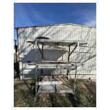 Metal Shelf with Scrap Metal Pieces