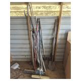 Assorted Shovels, Rakes, and Brooms