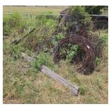 Assorted Barbed Wire Rolls and Wooden Post