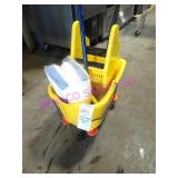 LOT, 1 PORTA MOP BUCKET W/ MOP & 2 NEW HEADS