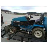 Ford lawn tractor with snow blade. Mower deck