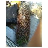 Roll chain link fence