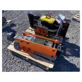 Unused Wolverine Skid Steer Post Driver