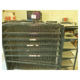 Black Metal Display Rack with Shelving and Pegboard Backing