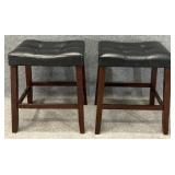 Pair Button Tufted Saddle Stools