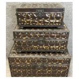 Three Metal Wrapped Nesting Trunks