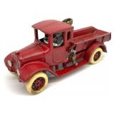 Cast Iron Red Dump Truck Figure