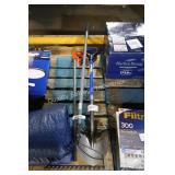 2 garden tools and clamp