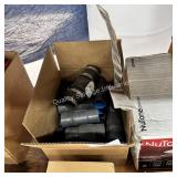 box of plumbing supplies
