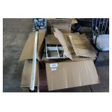 skid of light strips and sq light panels