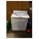 24" white vanity w top (front plate bent)