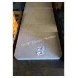 6ft used table (legs fold up)