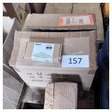 two boxes of phone cases