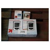3 blood pressure monitors & thermometer