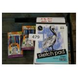 lot of bic pencils and sketch pads
