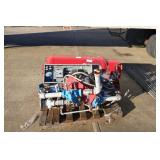 skid of metal pcs control panel and tank