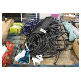 skid of water hose soaker hoses, etc