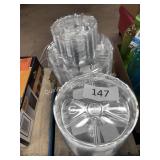 lot of plastic under pot trays - different sizes