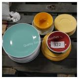 lot of plates and bowls