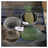 vintage cookware and artificial fruit