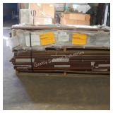 skid of dark colored wood