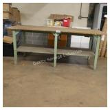 lg work table (damage to back leg) (lobby)