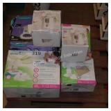 4 breast pumps and 2 bottle warmers