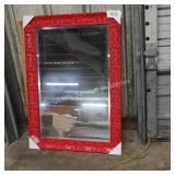red framed mirror