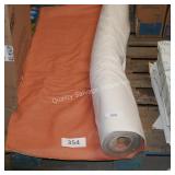 roll of orange fabric