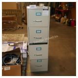 4 drawer metal file cabinet (damaged)