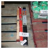 poster hanger and 2 posters