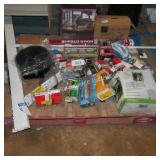 skid of door hardware, desk lamp etc