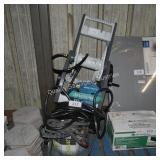 2 water hoses and hose reel