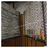 purple area rug  (size unknown)